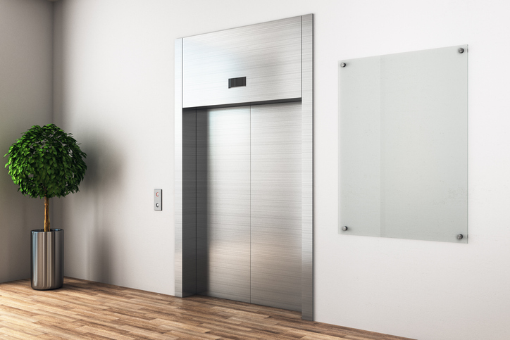 White modern interior with elevator and blank glass poster. Mock up, 3D Rendering